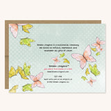 Back of blue greeting card with pink and green butterflies. It reads Brown Crayons is a multiracial company. We strive to reflect, represent, and empower all girls of color. 