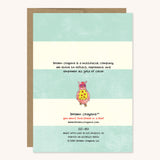 Back of striped greeting card with a pink owl. It reads brown crayons is a multiracial company. we strive to reflect, represent, and empower all girls of color. 