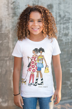 Brown girl wearing white Brown Crayons t-shirt